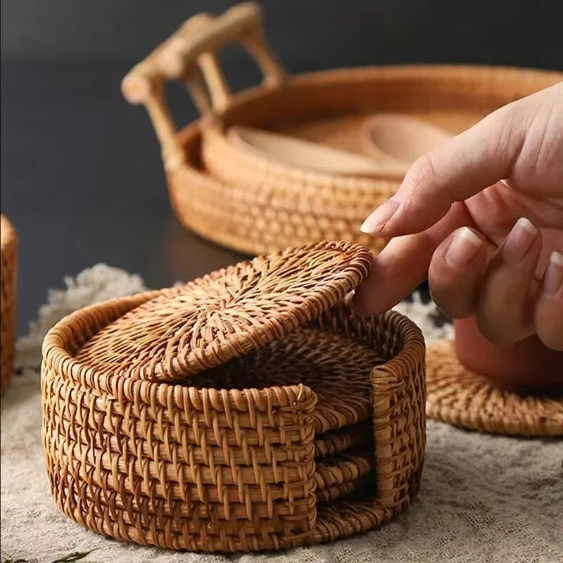 Set of six round rattan coasters – shown in use