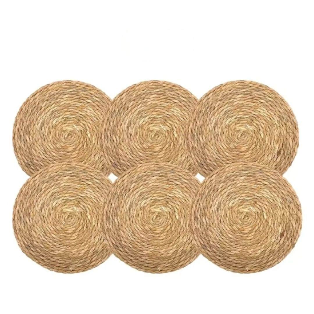 Set of six round braided straw placemats
