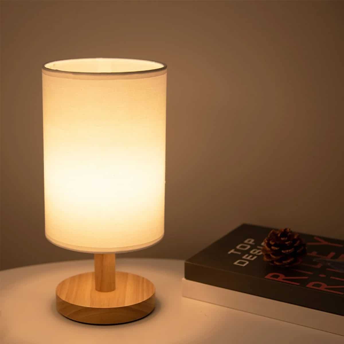 Woven wood decorative light fixture – shown lit