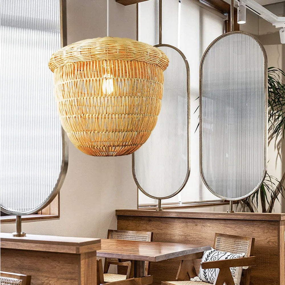 Hazelnut-shaped handwoven natural bamboo chandelier – shown in a room setting