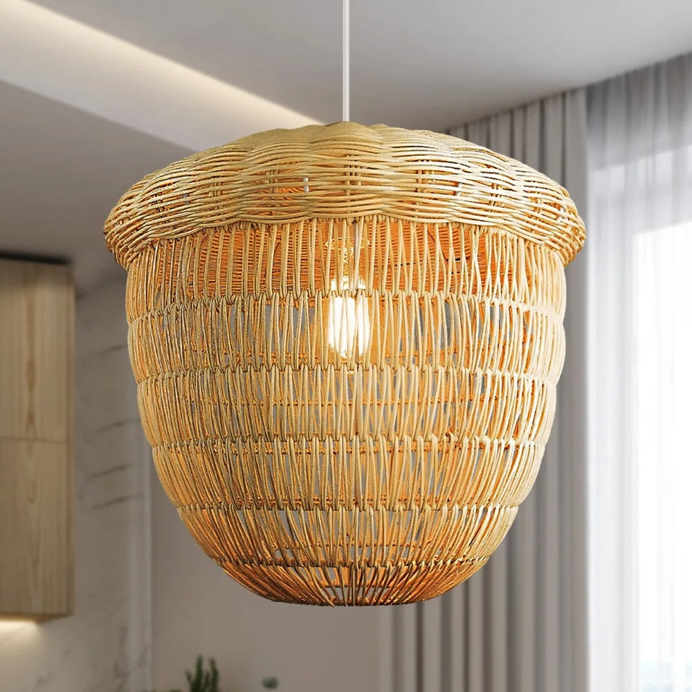 Hazelnut-shaped handwoven natural bamboo chandelier – shown lit