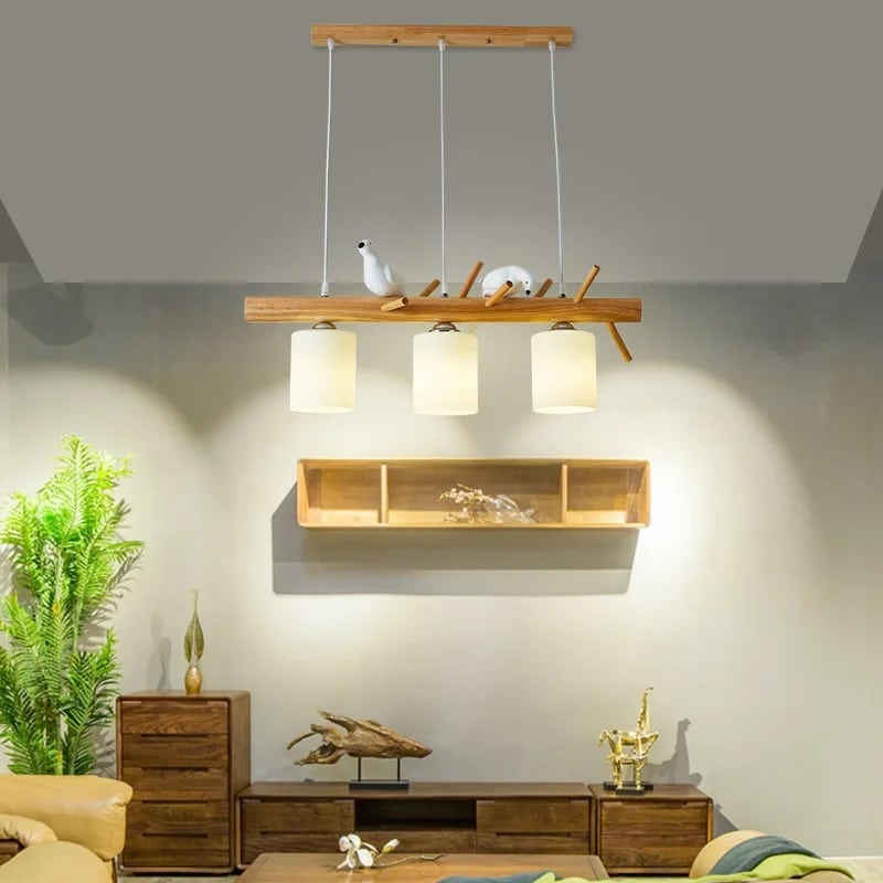 Modern geometric solid wood chandelier with a natural finish – shown in a room setting