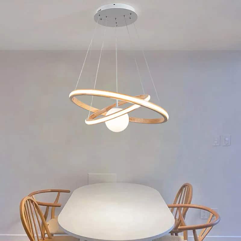 Minimalist handcrafted natural wood LED chandelier – shown in a room setting