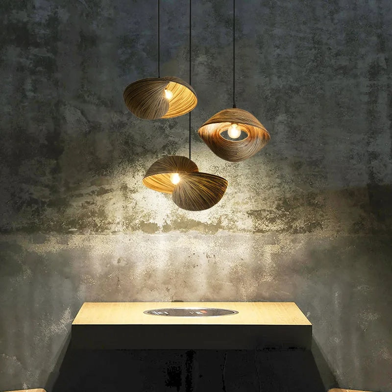 Rattan-look woven seashell chandelier – shown lit (2)