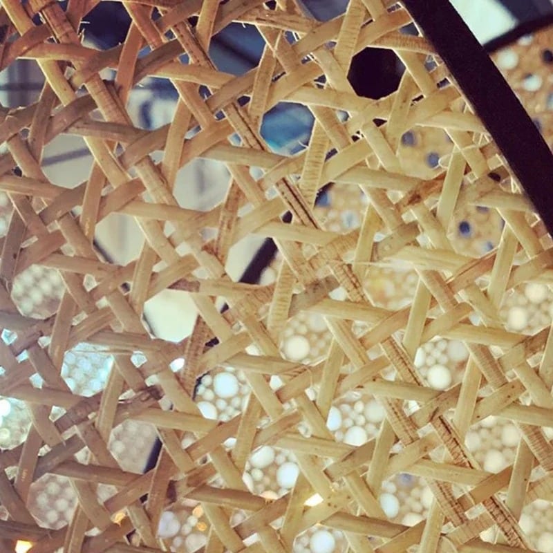 Modern geometric chandelier in rattan with woven bamboo slats – close-up detail (2)