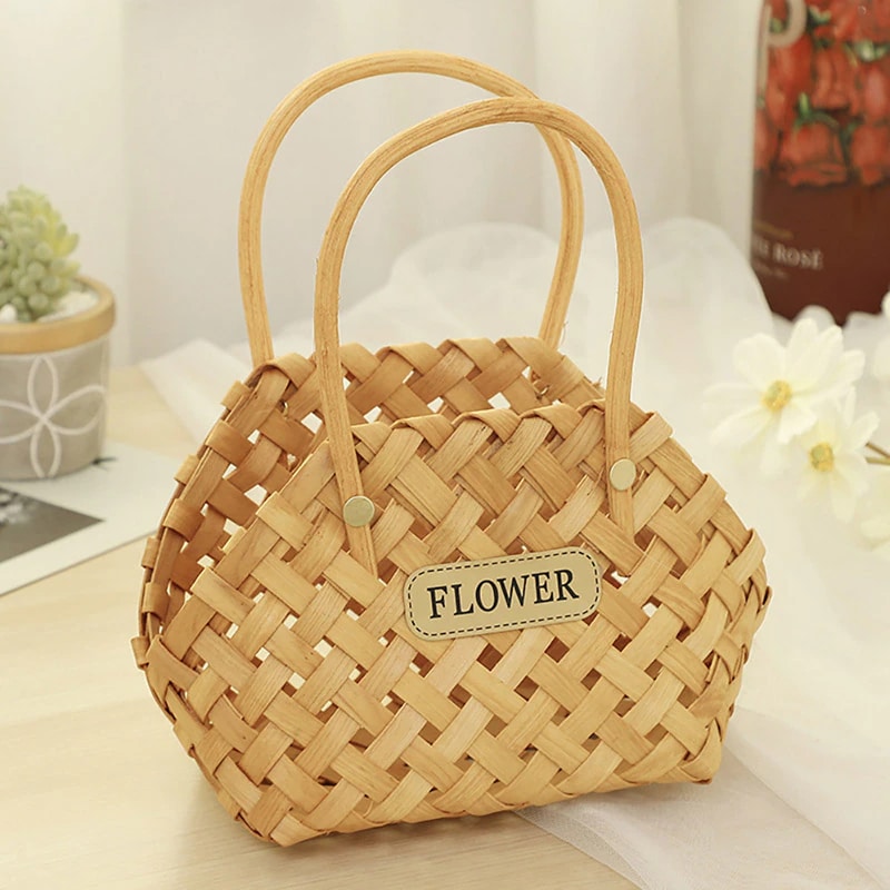Mini woven flower basket with painted florals and beige fabric lining