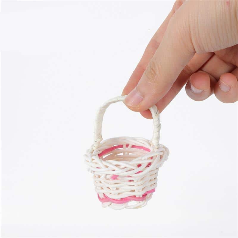 Set of ten mini handwoven flower baskets – white version, shown in use