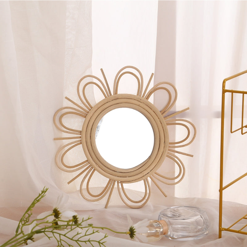 Double flower rattan mirror with layered petals – shown in a room setting (2)