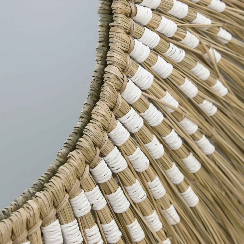 Boho round rattan wall mirror with an interlaced frame – close-up detail