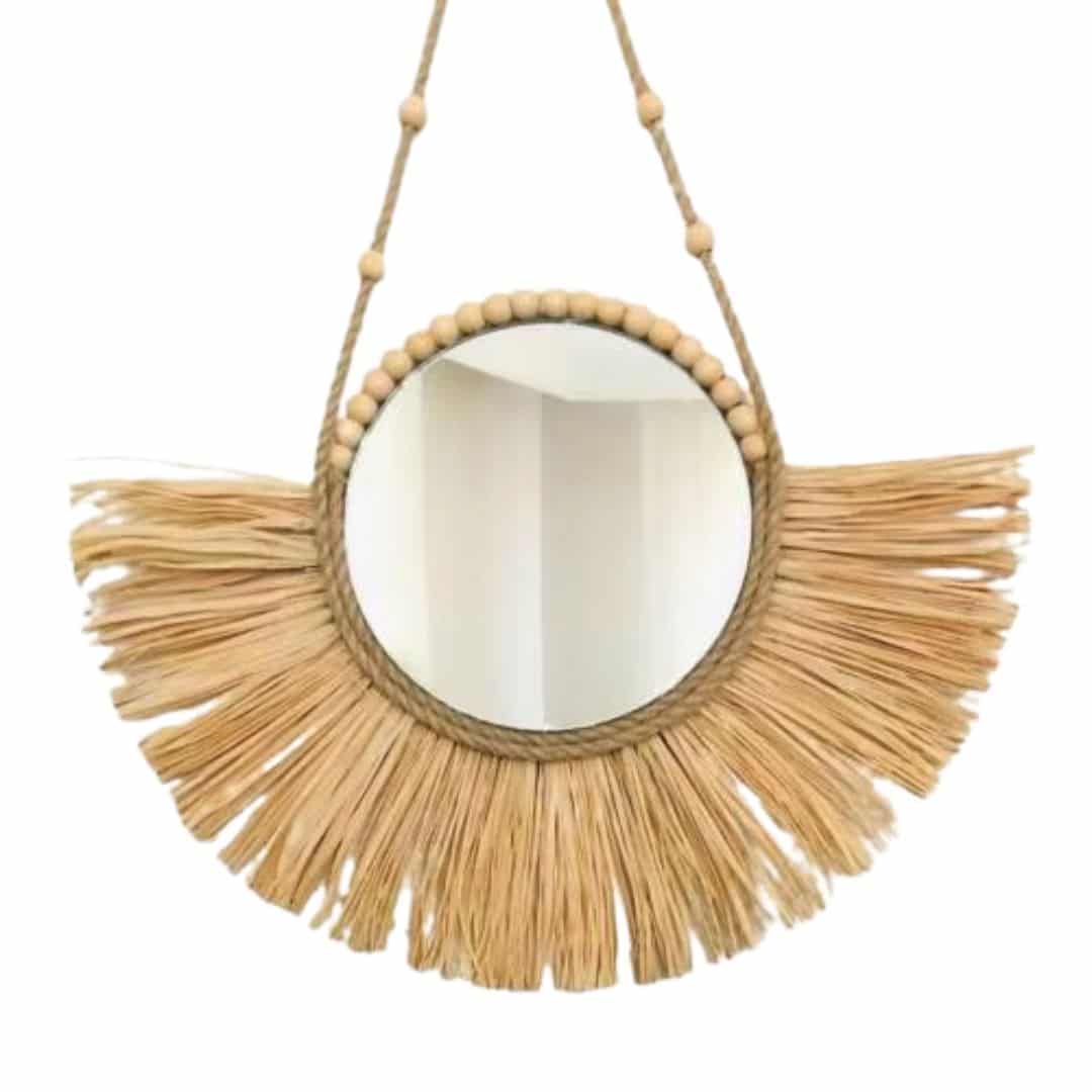 Round braided straw mirror edged with a trim of beads