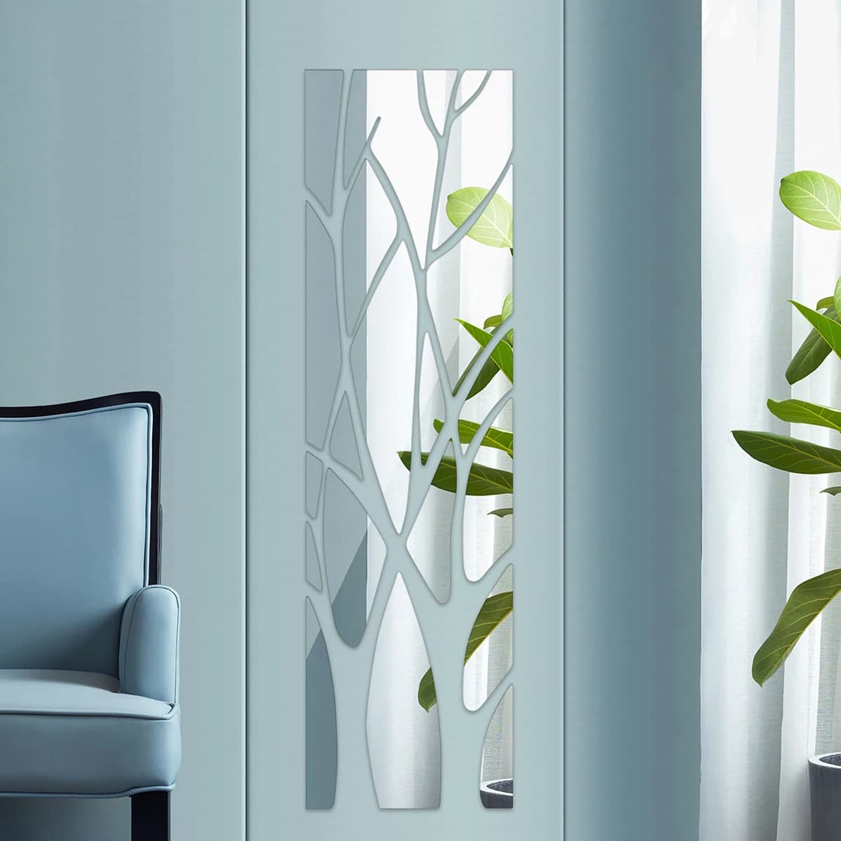 Self-adhesive door mirror framed by a braided rattan branch wreath – shown in a room setting