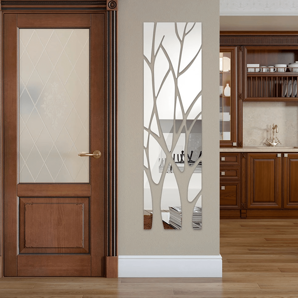 Self-adhesive door mirror framed by a braided rattan branch wreath – shown in a room setting (2)