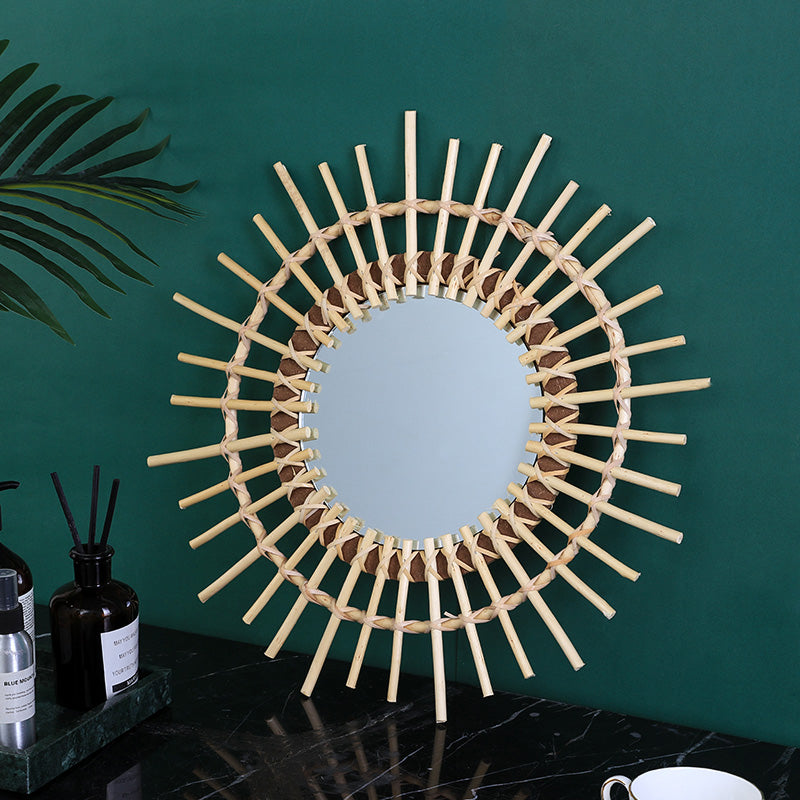 Large beige rattan sun mirror with a crown of braided rays – shown in a room setting (2)
