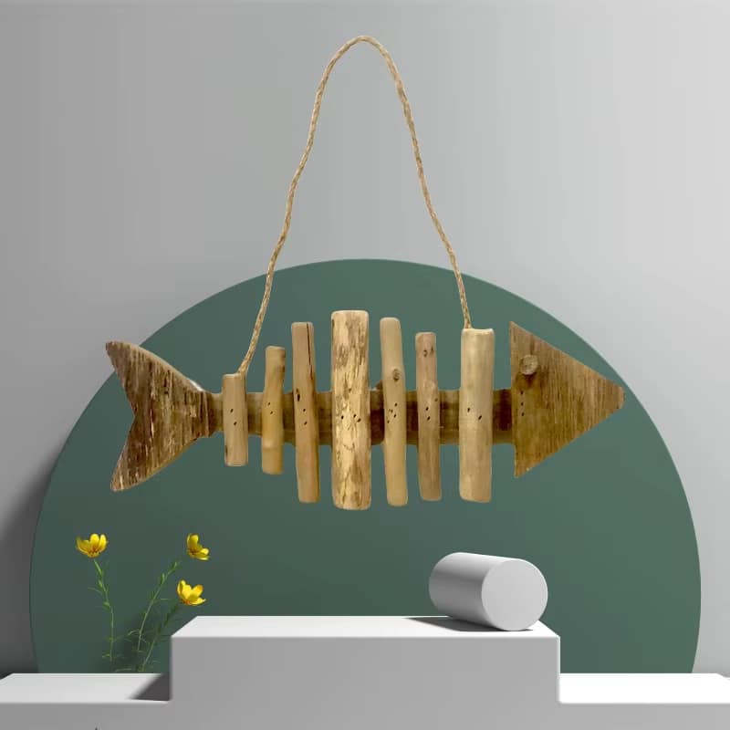 Carved wooden fish ornament – shown in a room setting