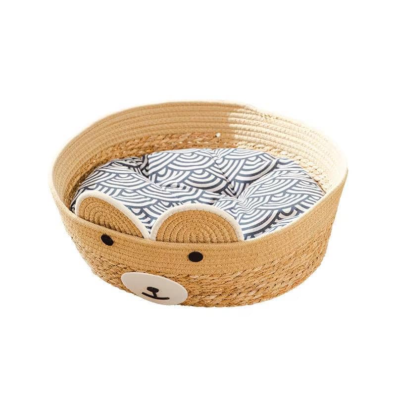 Dog-shaped handwoven wicker dog bed with ears and snout