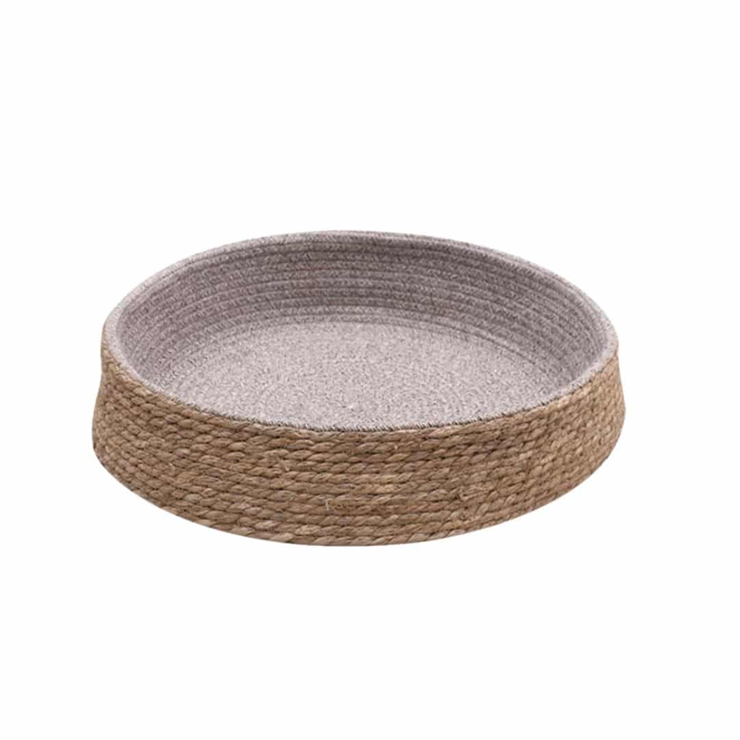 Round handwoven wicker dog bed with gray and beige padding