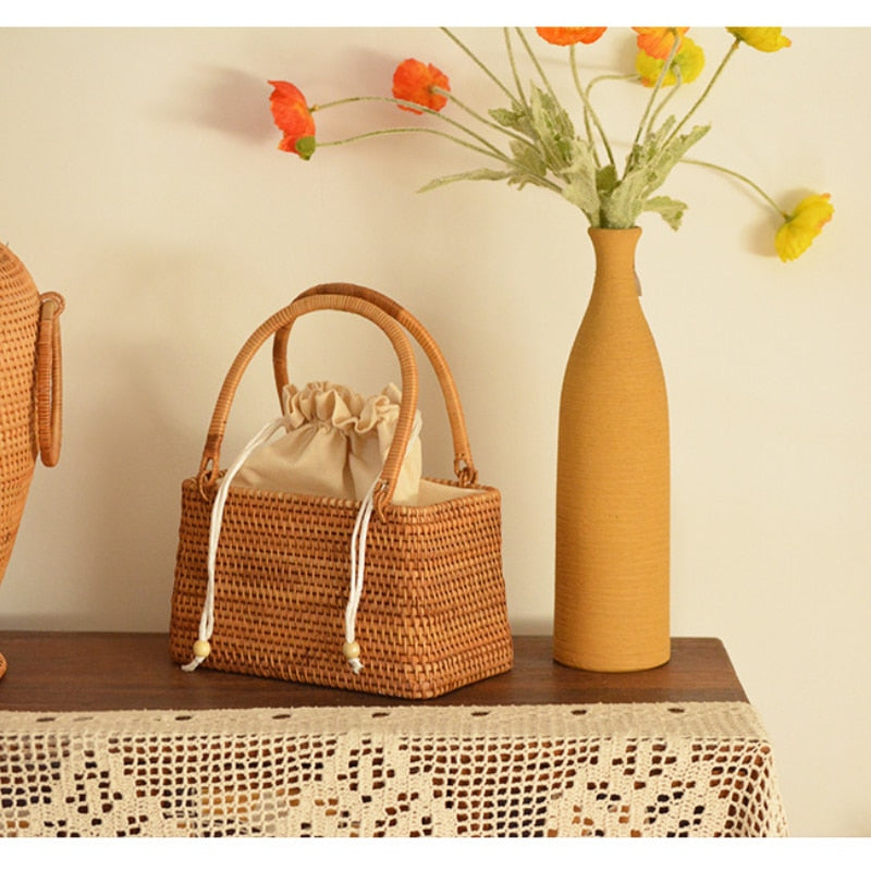Rectangular handmade pure rattan picnic basket – shown in a room setting