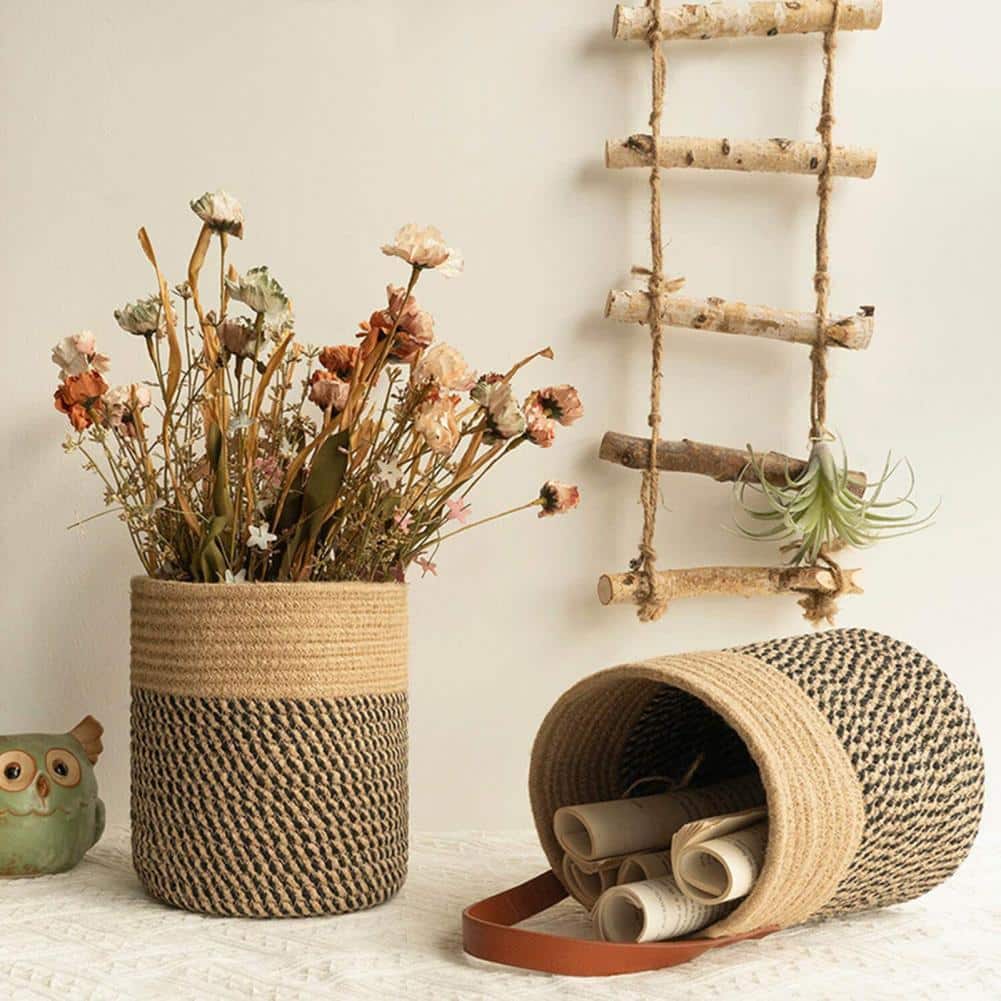 White handwoven plant-fiber hanging storage basket – shown in a room setting