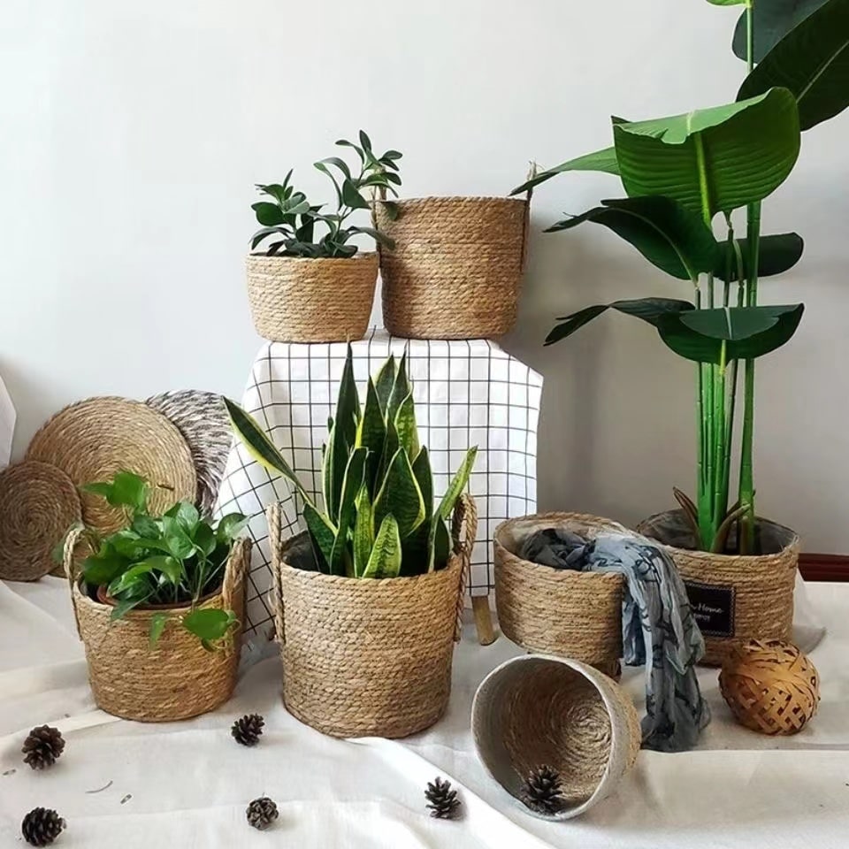 Open-weave natural wicker basket for garden, flowers or laundry – shown in a room setting (2)