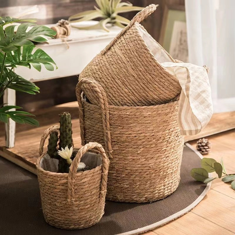 Open-weave natural wicker basket for garden, flowers or laundry – shown in a room setting (3)