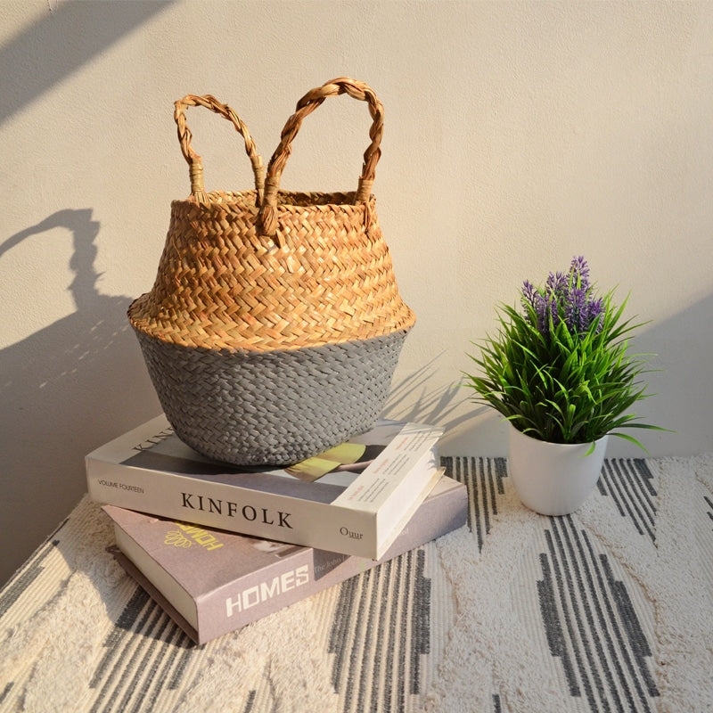 Boho two-tone foldable rattan storage basket with handles – gray version, shown in a room setting