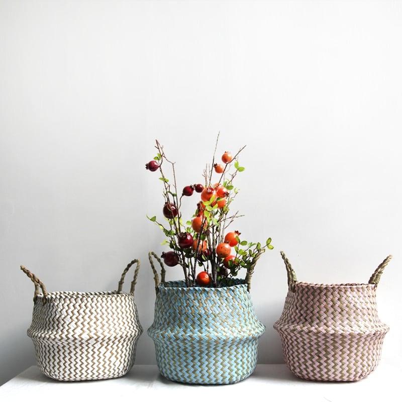 Boho striped foldable rattan storage basket – shown in a room setting