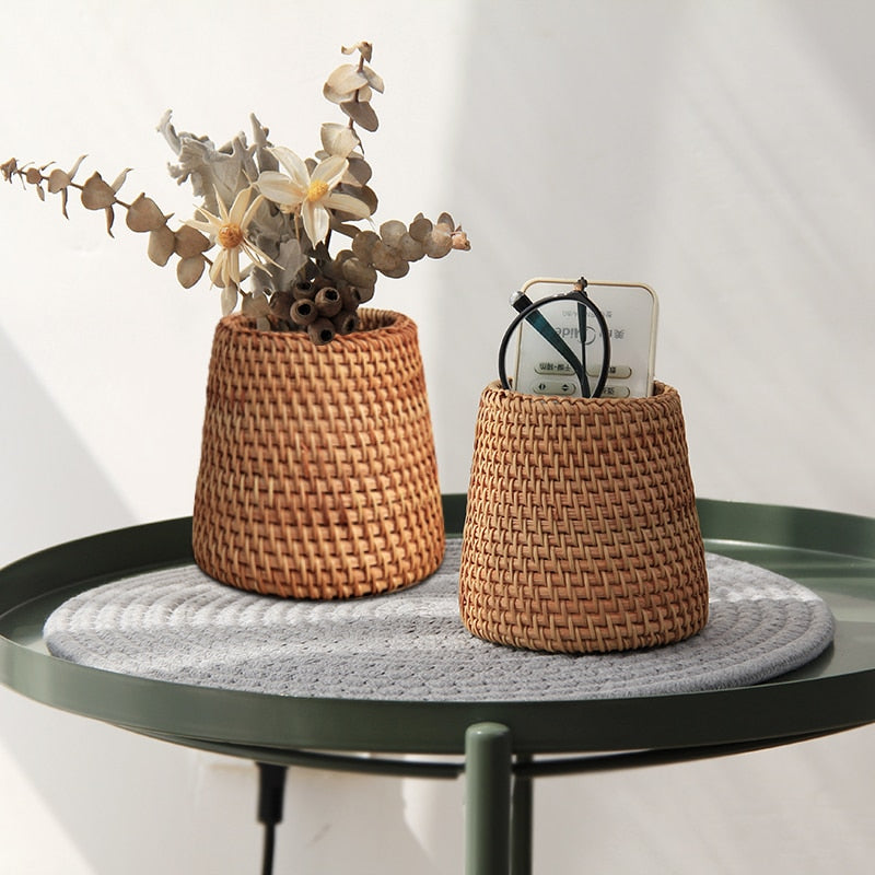 Golden woven rattan household basket – shown in a room setting (2)
