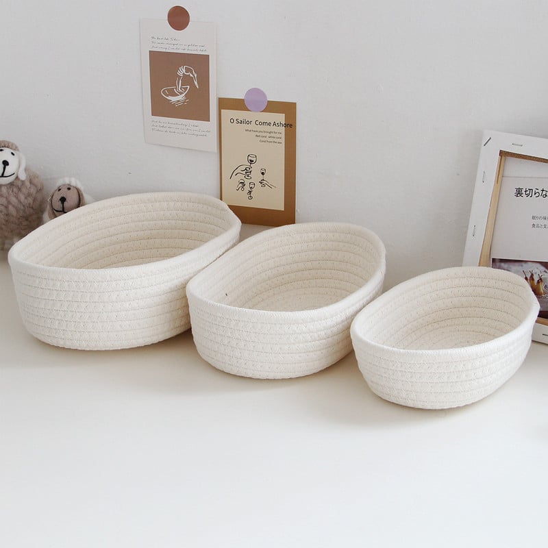 White oval handwoven cotton rope storage basket – multiple views
