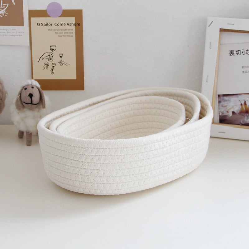 White oval handwoven cotton rope storage basket – multiple views (2)