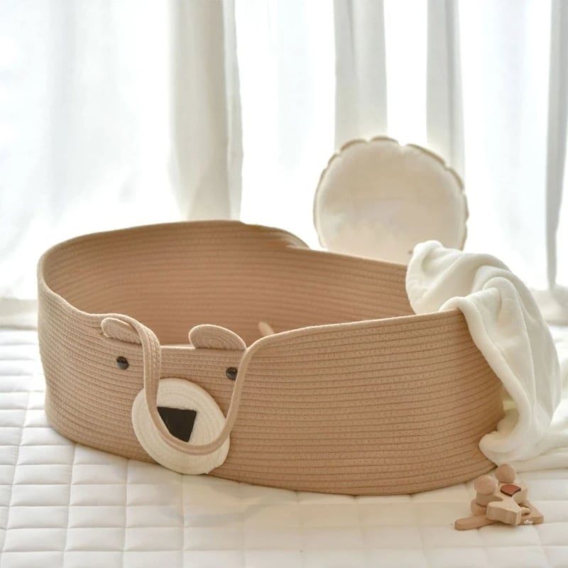 Wicker-look changing basket with a teddy bear motif – shown in a room setting