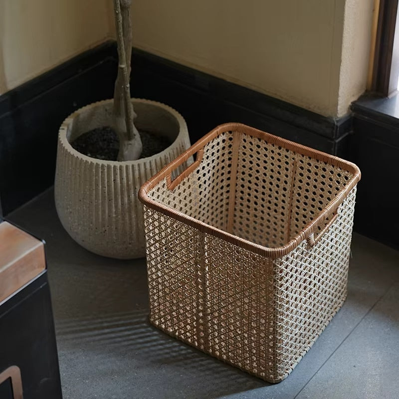 Square rattan laundry basket in natural beige – shown in a room setting