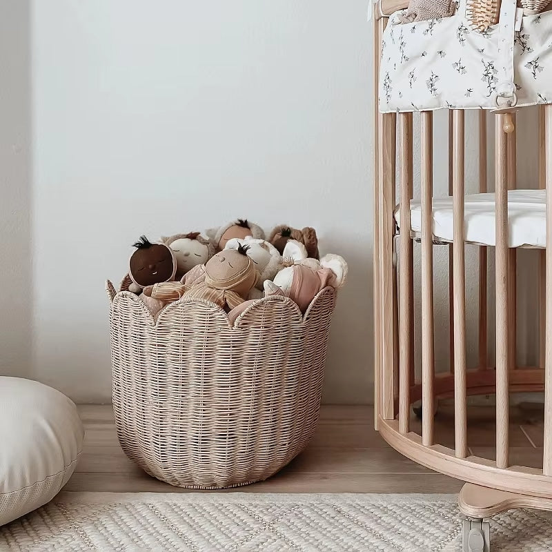 Flared rattan laundry basket in natural beige with a Nordic look – shown in a room setting