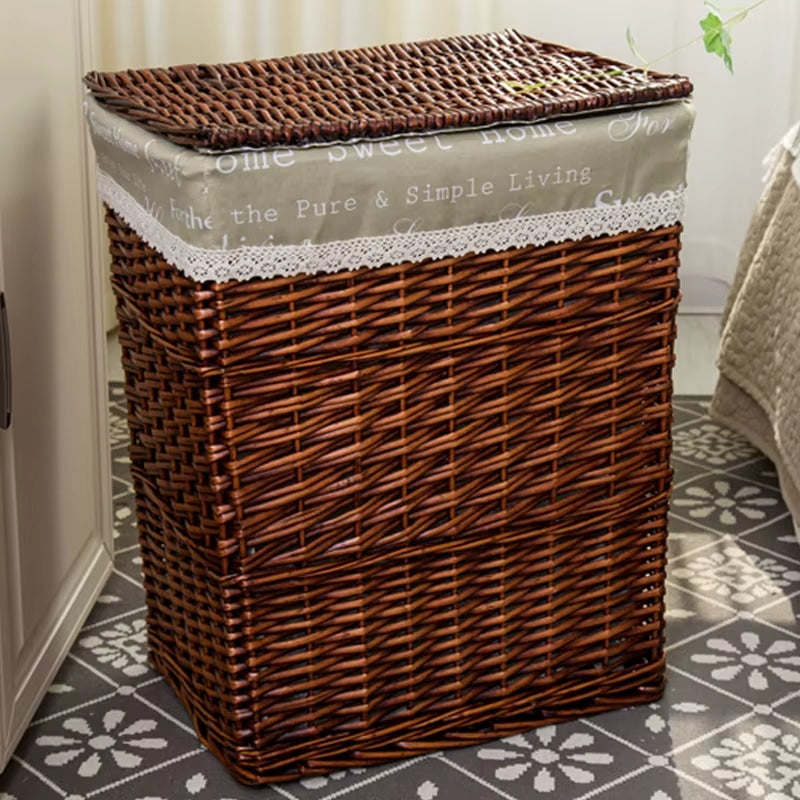 Retro brown rattan laundry basket with a curved lid – shown in a room setting