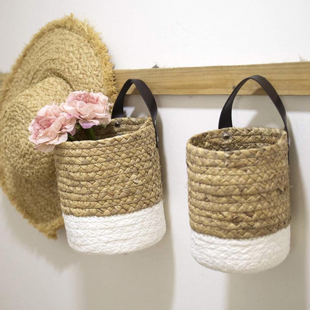 Hand-braided hanging rattan plant basket – shown in a room setting (2)