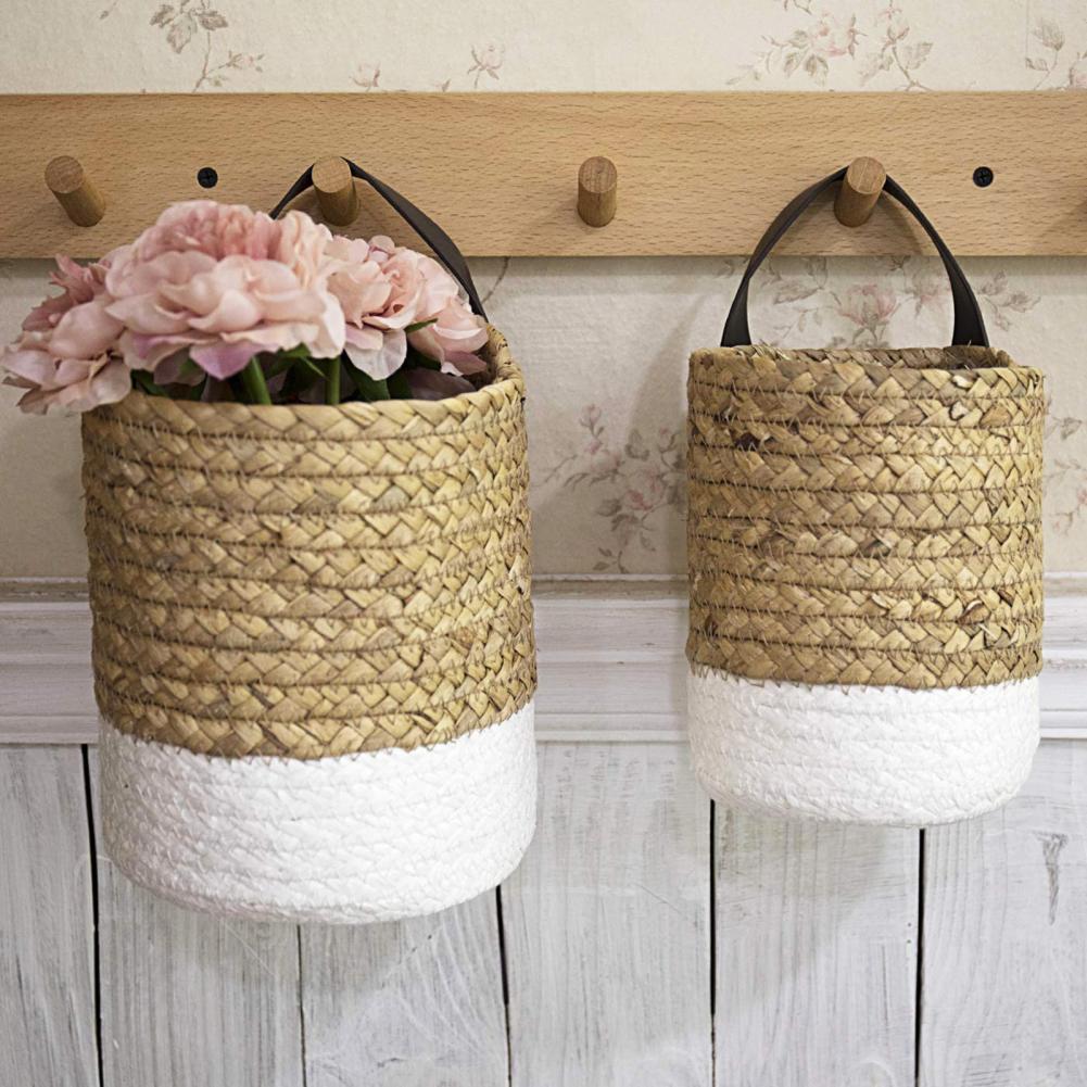 Hand-braided hanging rattan plant basket – shown in a room setting (3)