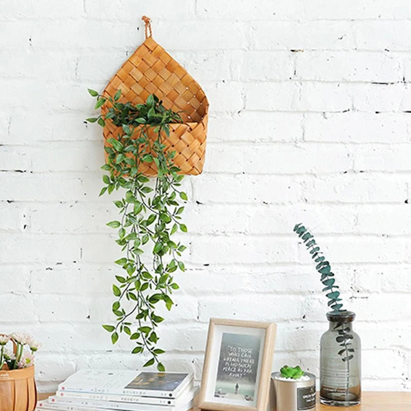 Vintage rattan-look round handwoven storage basket – shown in a room setting (3)