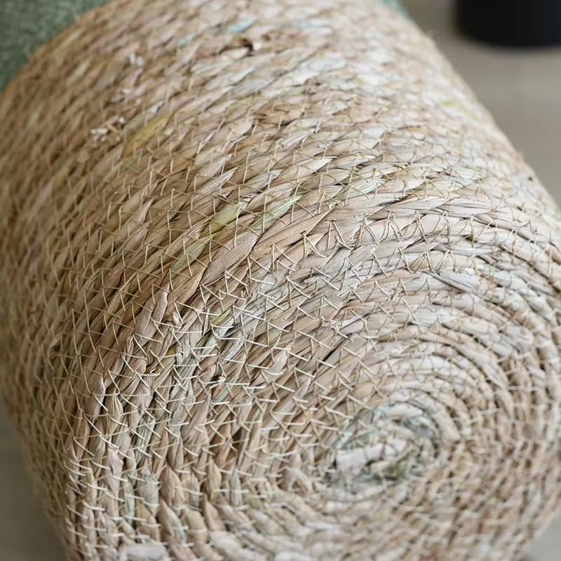 Modern handwoven rattan basket with a bold green rim – close-up detail