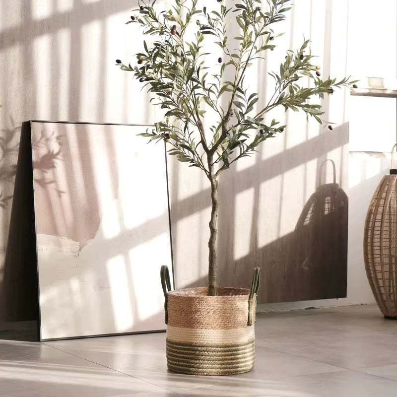Boho rattan basket with fine green stripes – shown in a room setting