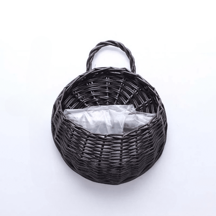 Handmade rattan basket with a crafted handle – black variant, another view