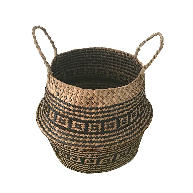 Handwoven natural rattan home basket with an even braid