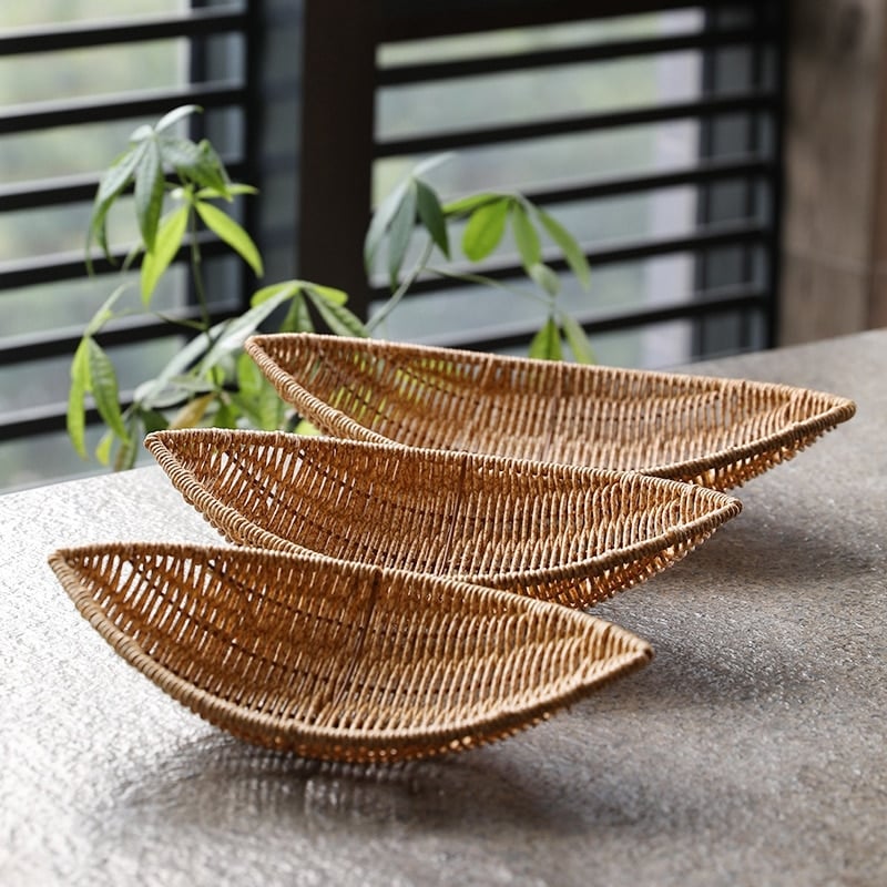 Open woven natural rattan produce basket – shown in a room setting (2)
