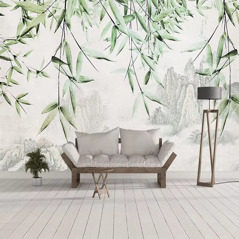 Wall mural of bamboo stems against distant mountains – shown in a room setting