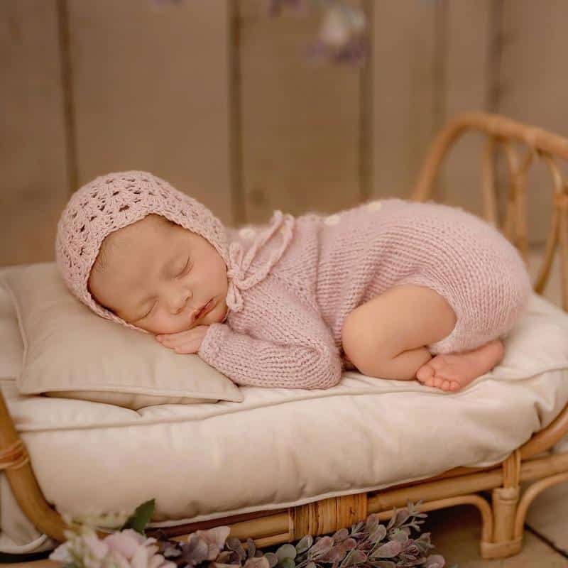 Small openwork rattan baby bed – shown in use (2)