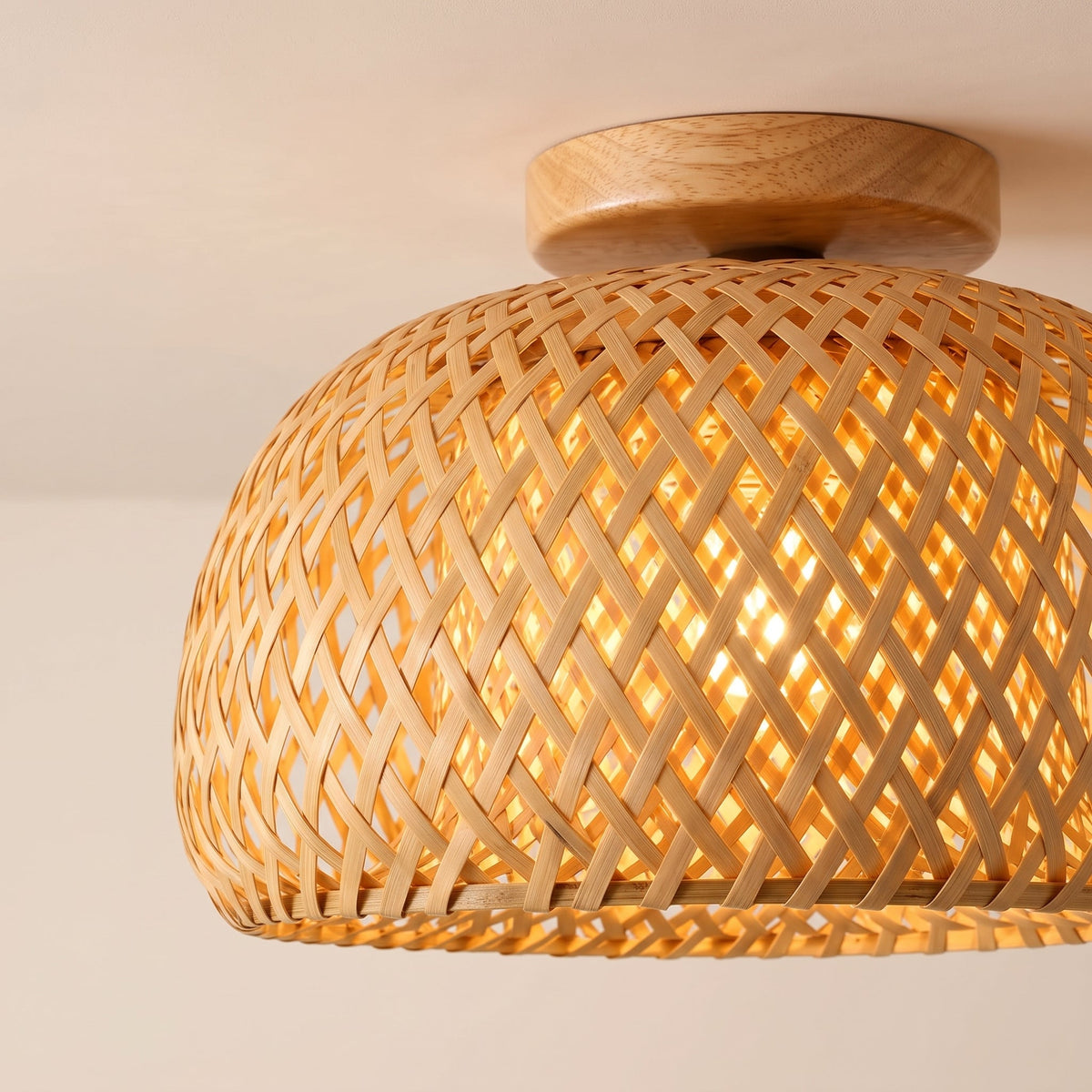 Woven bamboo dome flush mount light on a solid wood canopy – close-up detail