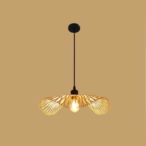 Balinese-style handwoven rattan ceiling light with a rounded silhouette – M variant, shown lit