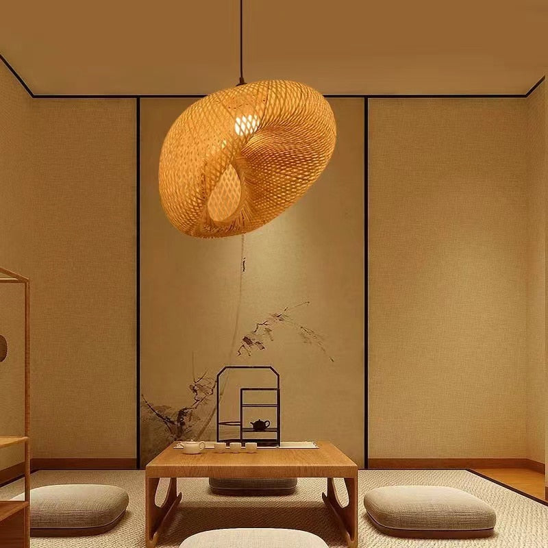 Chinese-style rattan and hand-braided bamboo slat LED ceiling light – shown lit in a room setting (2)