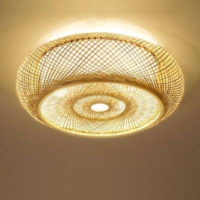 Open-weave hanging rattan ceiling light – close-up detail, lit (2)