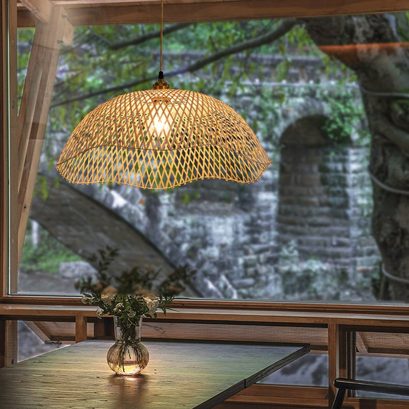 Modern geometric handwoven rattan, wicker and bamboo ceiling light – shown lit in a room setting (2)