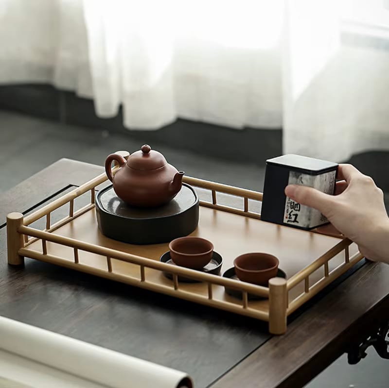 Japanese-inspired rectangular handwoven bamboo tea tray – shown in a room setting (2)
