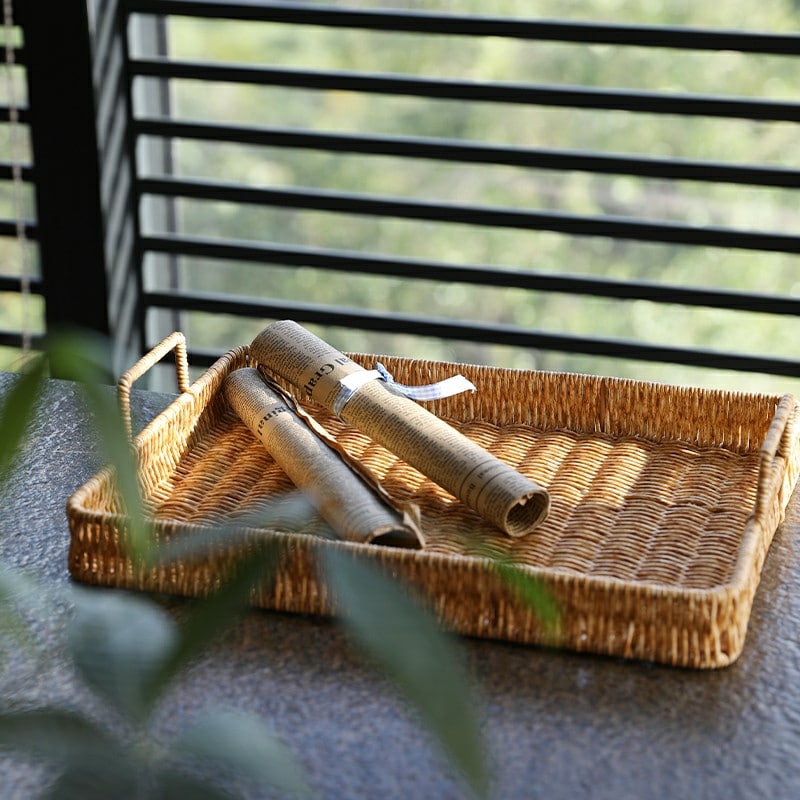 Faux rattan storage tray with sturdy handles – shown in a room setting (3)